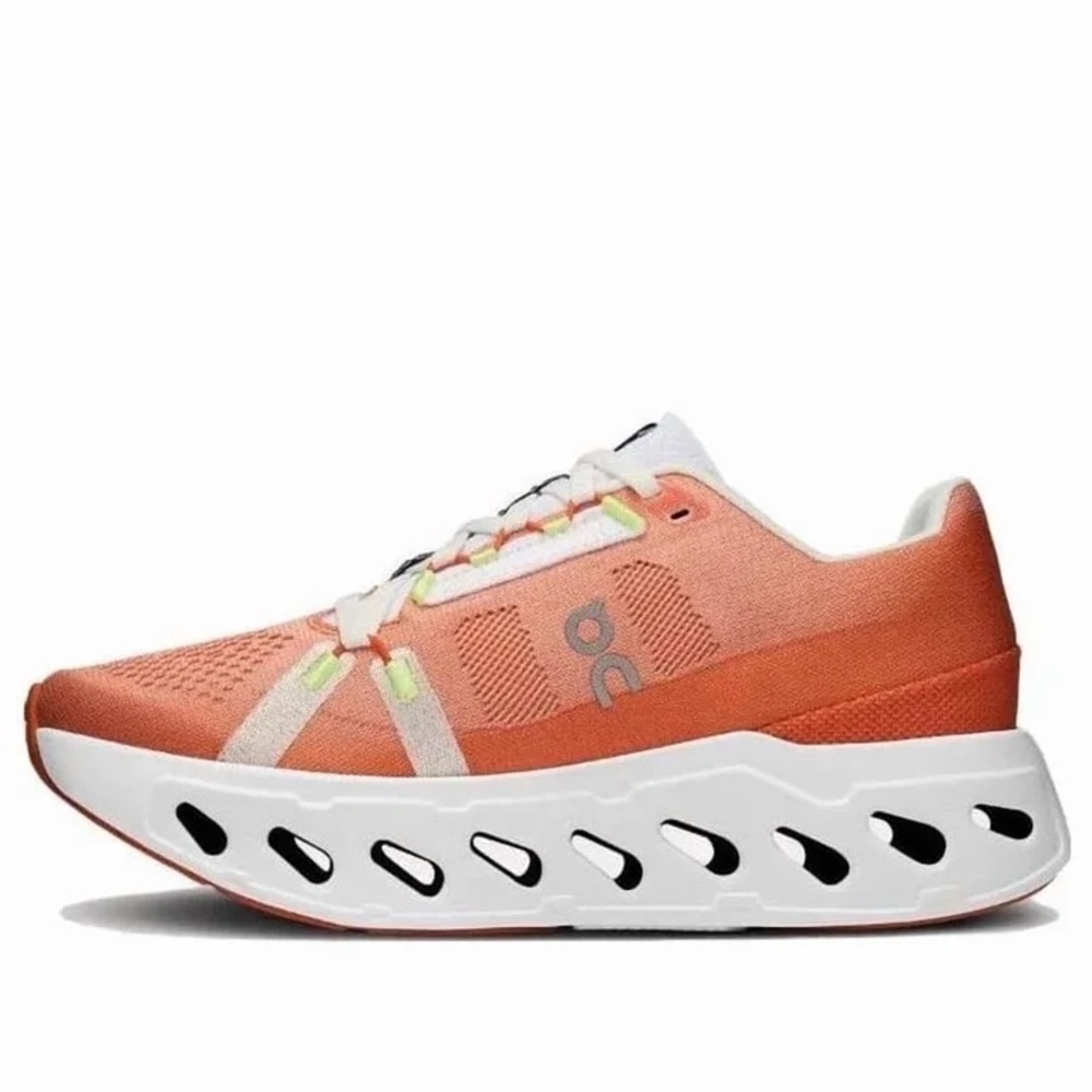 On Running Peach and White Sneakers